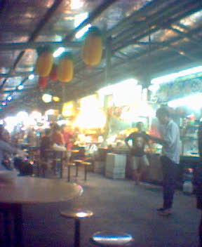 http://monkey.org/~jose/moblog/pics/singapore_hawker_stand.jpg